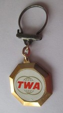 Porte clé vintage années 60, métal léger doré : logo TWA Compagnie Aérienne