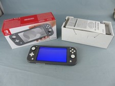 console NINTENDO SWITCH LITE pour pièces , écran bleu + boite 