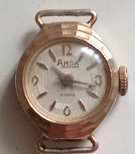 MONTRE MÉCANIQUE ANCIENNE POUR FEMME AMGA AVEC UN POINÇON