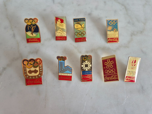Lot pins coca cola les - 9, et