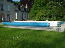 bâche à bulles protection piscine 12/6m complete avec son enrouleur.