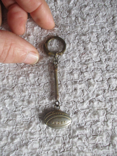Ancien porte clé - sport, au