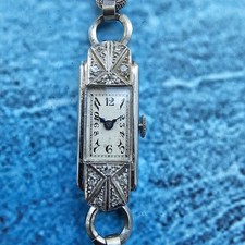 Montre vintage à remontage manuel pour femme en platine et diamants