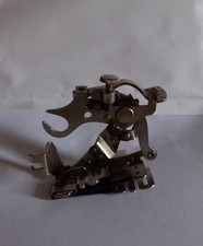 §- accessoire ancien machine à coudre SINGER référence SIMANCO B 120598 120.598
