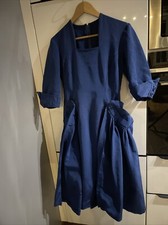 Ancienne robe vintage avec faux cul extérieur