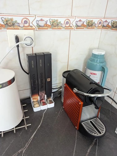 Distributeur capsules - de,