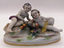 GROUPE / FIGRURINE CHERUBIN EN PORCELAINE ANGLAISE ANCRE DORÉ CHELSEA ?