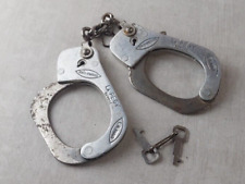 Ancienne paire de menottes, La Pegy Unis France, avec 2 clés