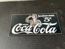 Plaque publicitaire Coca-Cola