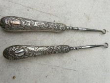 paire d'anciens crochets tire