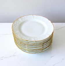 Limoges Lafarge. Lot de 9 assiettes à dessert en porcelaine modèle rocaille