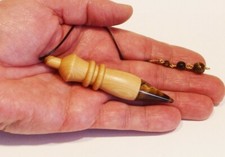 ° PENDULE EGYPTIEN BUIS
