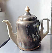 Théière isotherme Salam cloche métal argenté.