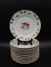 Belle série de 12 assiettes