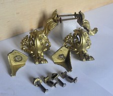 Lot de pieds de pendule + 2 décoration latérales