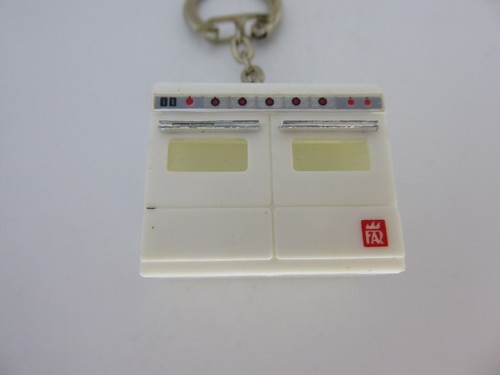 Porte clés key - key, far