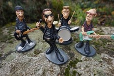 841.0011 4 FIGURINE MUSICIEN