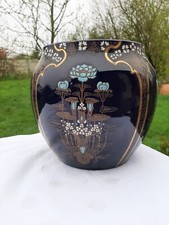 magnifique cache pot de lunéville fleurs a volutes et émaux turquoises et blancs