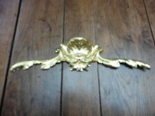 fronton en bronze coquille et
