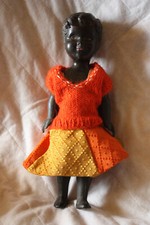 petite poupée de foire noire