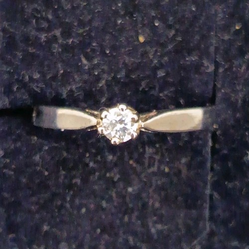 Bague sertie solitaire argent