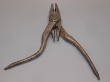 -ANCIENNE PINCE DOUBLE TETES 2