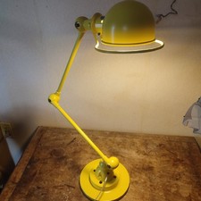 LAMPE Jielde jaune 2 bras sur socle.