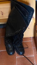 Bottes lacees cuir noir