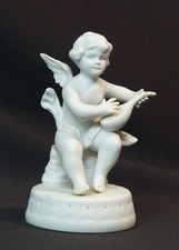 A Sèvres F. KESSLER sculpture porcelaine biscuit angelot putti musicien 160g12cm
