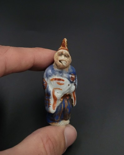 Netsuke singe déguisé en - -,