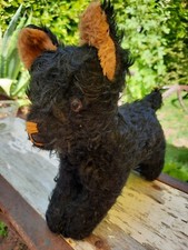 Petit chien NOIR peluche ancienne  avec rembourrage paille