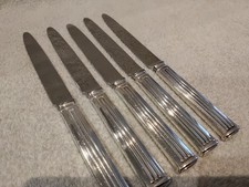 5 couteaux de table métal