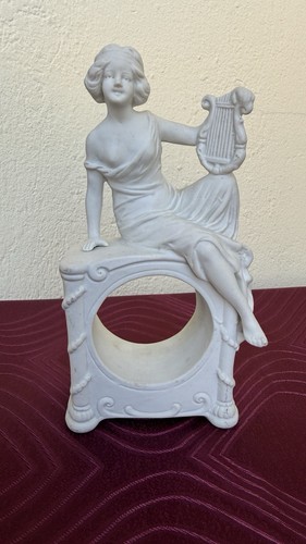 Figurine porte montre