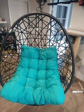 Fauteuil oeuf suspendu ajouré avec coussin gris