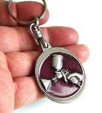 Porte clé mini pistolet peinture aérographe. Métal émail.