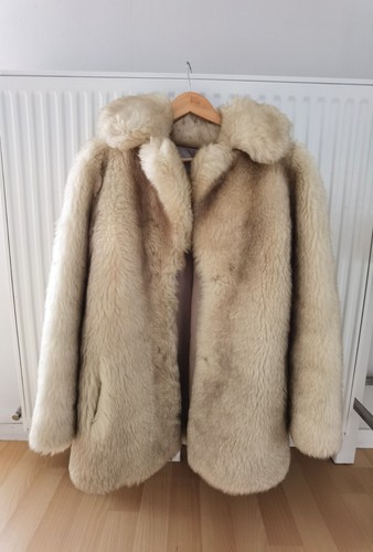 Manteau véritable peau - en,