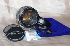 Objectif M42 50mm f1,4 Super TAKUMAR bouchons, filtre, pare-soleil et housse TBE