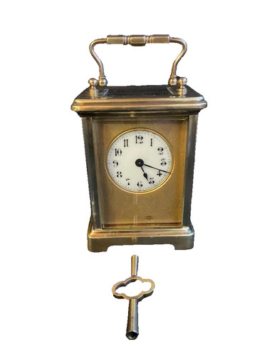 Pendule voyage dite - de,