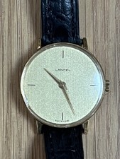 Montre Vintage LANCEL / Circulaire, métal doré /  Fab. SUISSE / Quartz