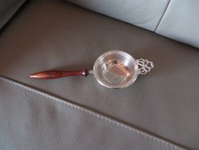 passe thè en métal argenté