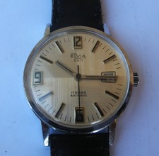 3403* montre elvia a remontage mécanique pour homme année 1980