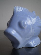 Stylized Fish Breaking Piggy