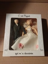 Figurine  pour gâteau mariage Mariée traînant le marié Hauteur 14 cm De Peynet