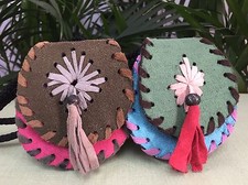 One Multi Color Leather Pouch