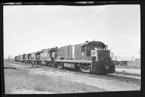 Rock island u25b - island, w/freight
