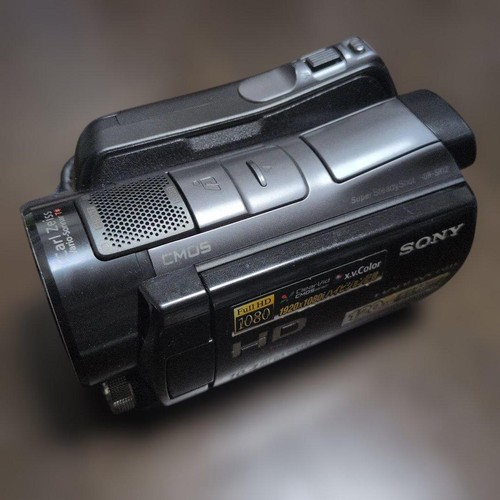 Chargeur trépied caméscope