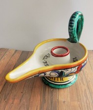 Bougeoir à main, publicité