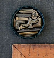 Lot de fers à dorer plaque