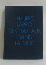 Des bateaux dans la nuit |