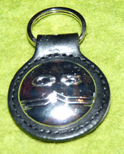 Porte clés neuf cuir et acier